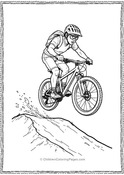 A Cyclist Jumping Over A Small Hill On A Mountain Free PDF Printable